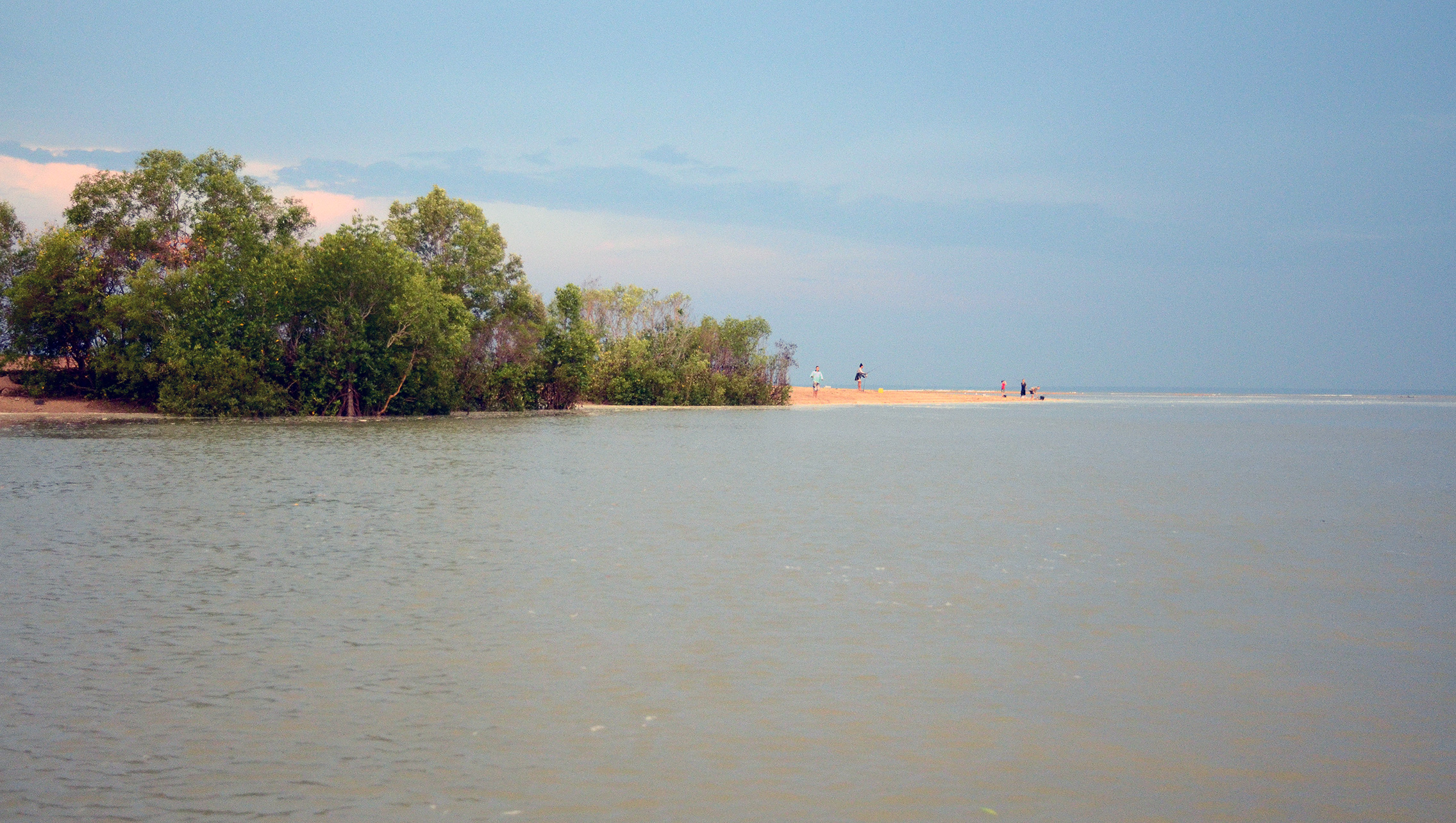Hopeful anglers fishing from a sandspit at the mouth of Buffalo Creek on Darwin's outskirts. This would not be a smart move at night and even during the day, you need your wits about you!