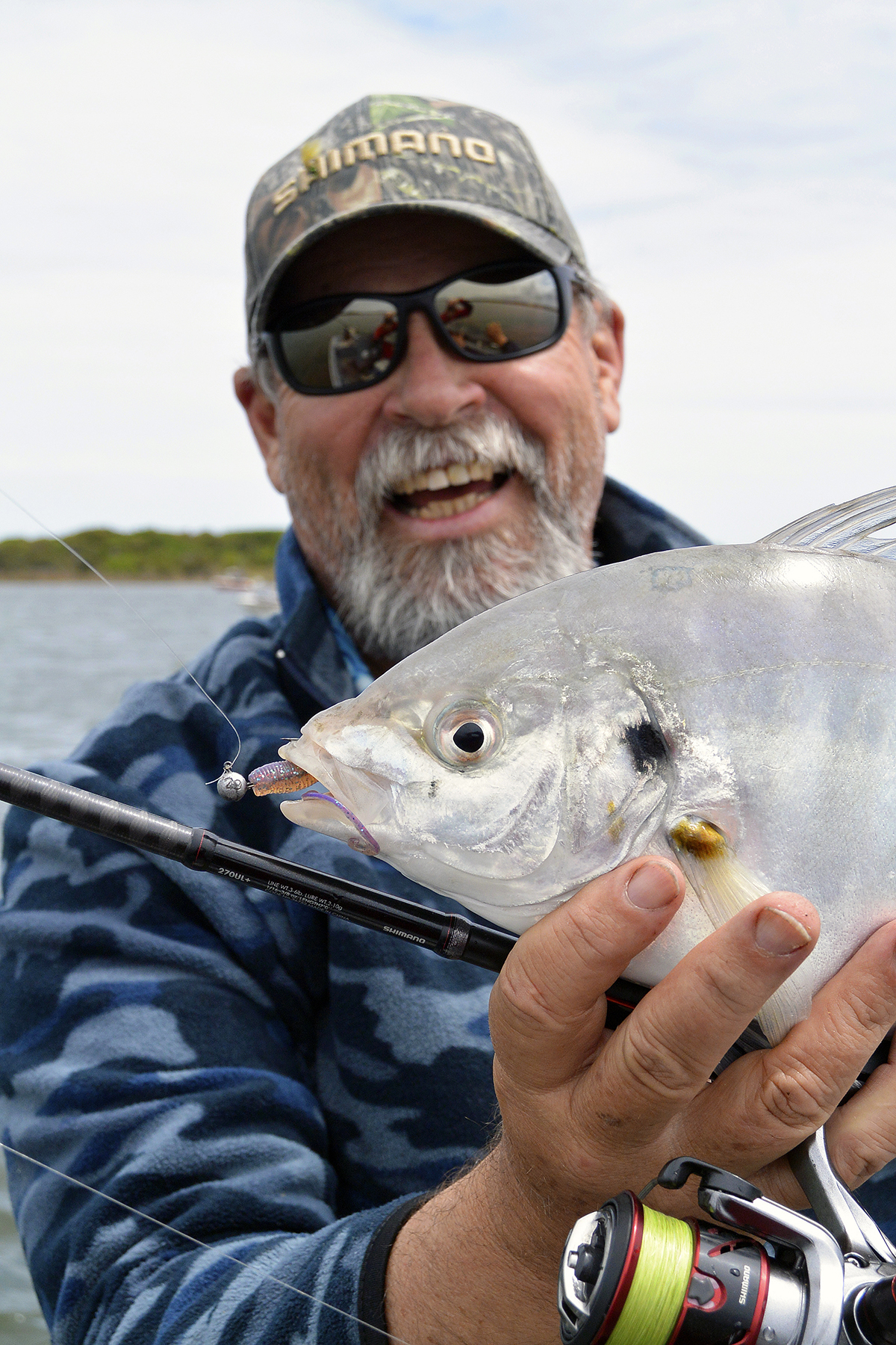 Starlo with a silver trevally, Glenelg River, Nelson, VIC.