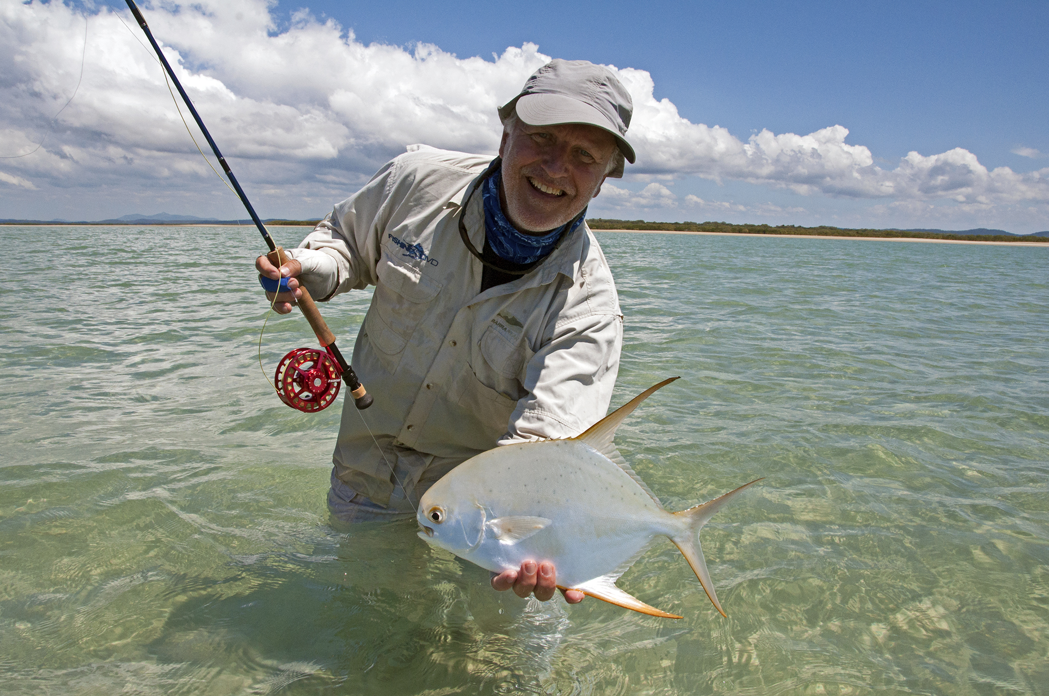 The inshore flats fishing isn't bad either! John Haenke with a neat little permit on fly.