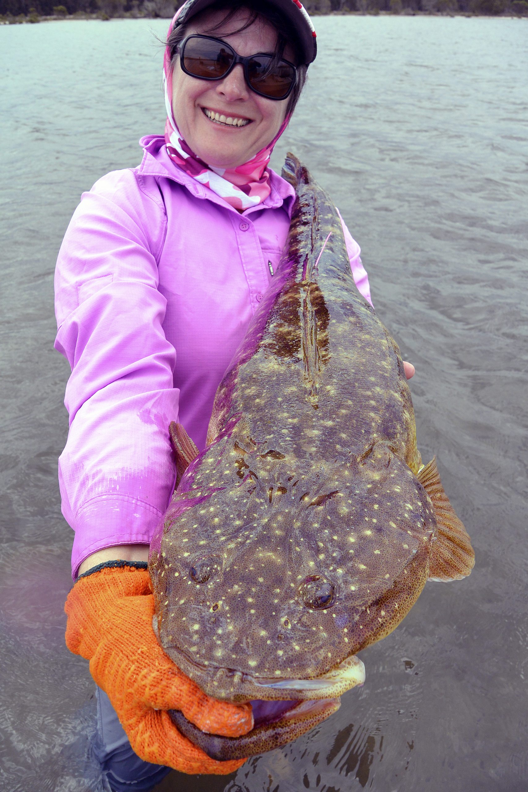 Jo Starling with a magnificent 91 cm dusky flathead, tagged and ready to be released. Tuross estuary is a "Trophy" flathead fishery.
